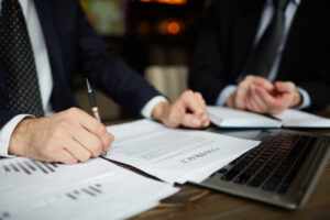 Businessman editing and negotiating his own NDA