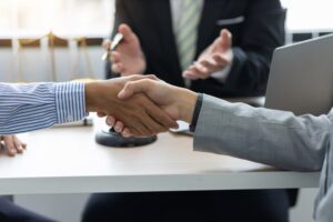 Business partners shaking hands