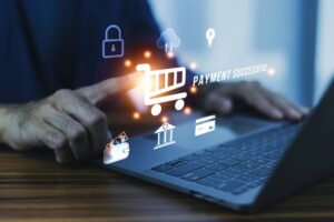 Fintech & payment processor Laptop user making electronic payments online