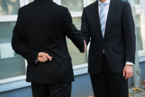 Buseness partners shaking hands.