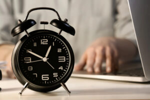 Alarm clock on an employees desk